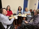 Mediline Supported Living eating soup