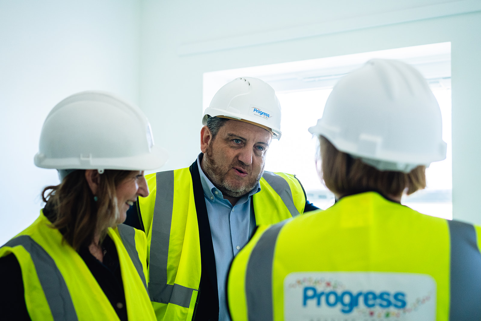 Progress employees inspecting a new development