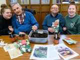 Residents planting seeds 